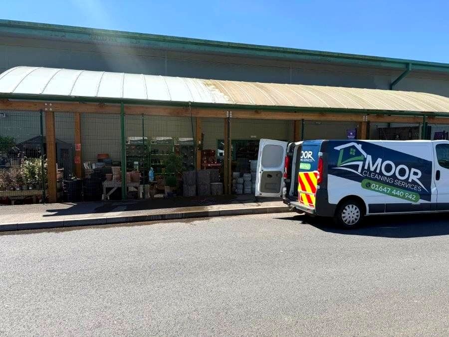 Moor Cleaning Services van parked outside a business premises in Devon